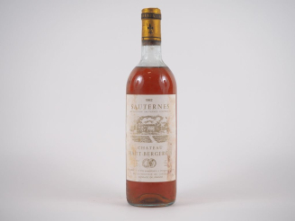 Vente aux enchères 1 BOUTEILLE CHÂTEAU HAUT BERGERON SAUTERNES - 1982 - HEP