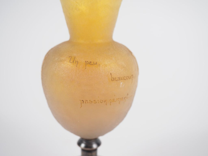 DAUM Nancy. Vase en verre jaune nuancé à décor polychrome et doré grav