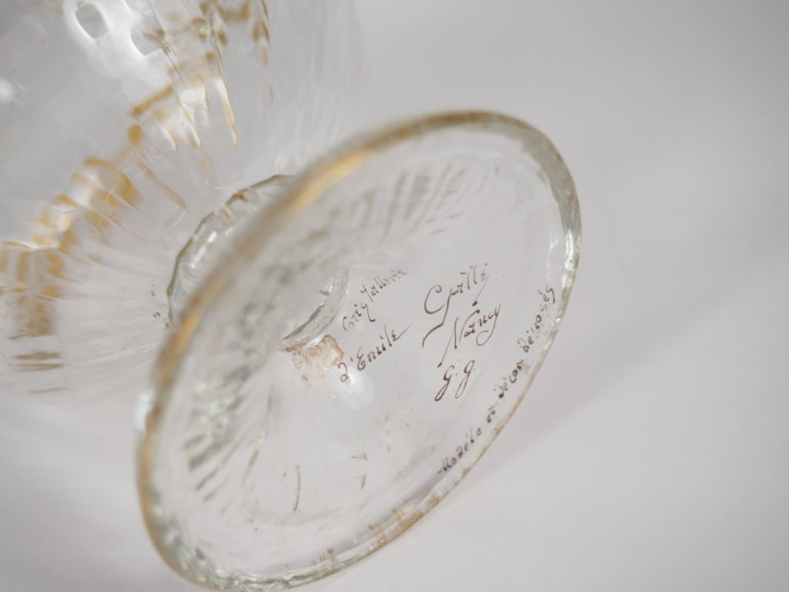 GALLE.  Partie de service de verres en cristal, à décor doré de feuill