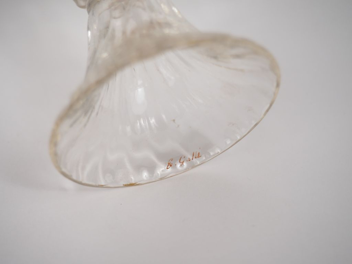 GALLE.  Partie de service de verres en cristal, à décor doré de feuill