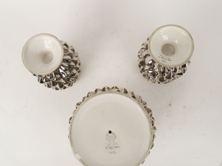 Christian DIOR.  Paire de vases Ananas en porcelaine argentée. Signés.