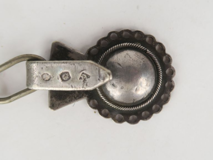 Boucle de ceinture début XIXème en argent à décor ajouré et orné d'un 