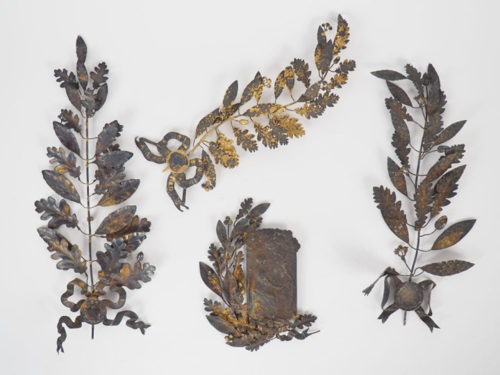 Quatre palmes de récompense en argent doré à décor de feuilles de chên
