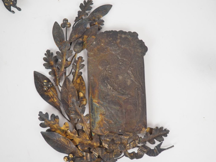 Quatre palmes de récompense en argent doré à décor de feuilles de chên