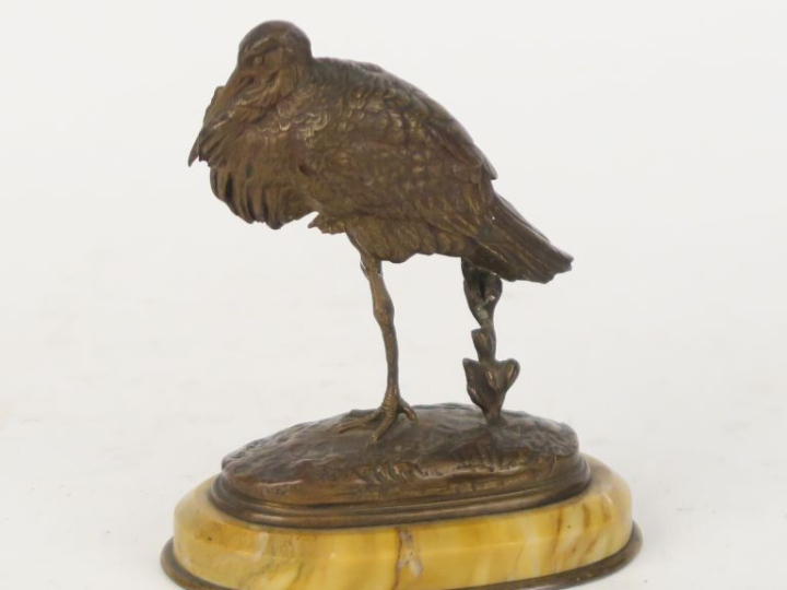 DEMAY.  'le héron".  Sculpture en bronze à patine médaille, sur un soc