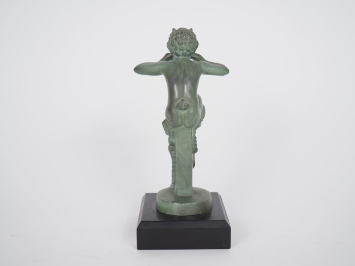 MIC. "Pan". Sujet en régule en patine verte. H. (avec le socle) 19 cm.
