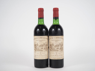 Vente aux enchères 2 BOUTEILLES CHATEAU CARBONNIEUX GCC GRAVES - 1975 - LB/ELS