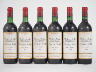 Vente aux enchères 6 BOUTEILLES CHÂTEAU SEGUR CB HAUT MÉDOC - 1982 - 2 BG/BLS