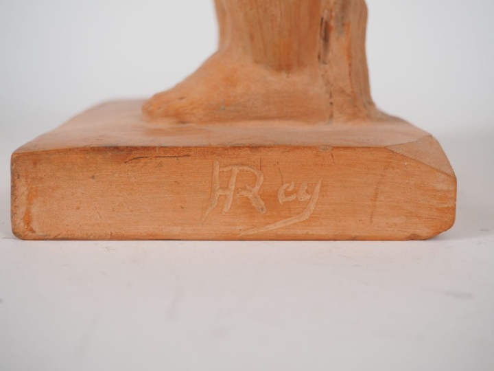 Henri Paul REY.  "jeune fille à la colombe" Sculpture en terre cuite  