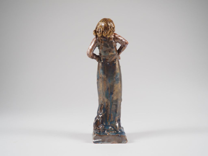 Henri Paul REY.  "jeune fille en robe longue" Sujet en terre vernissée