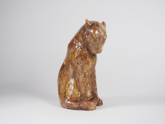 Vente aux enchères Henri Paul REY.  "félin assis" Sculpture en terre cuite vernissée  Sig