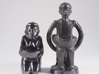 Vente aux enchères Henri Paul REY.  Saleron double en terre vernissée et émail noir figur