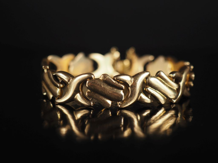 Bracelet gourmette en or 750, maillons articulés en forme de godrons e