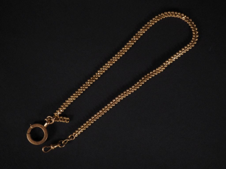 Vente aux enchères Fragment de giletière en or Poids : 10 g   