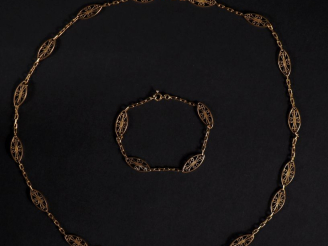 Vente aux enchères Parure en or 750 comprenant : collier et bracelet, maillons ovales ajo