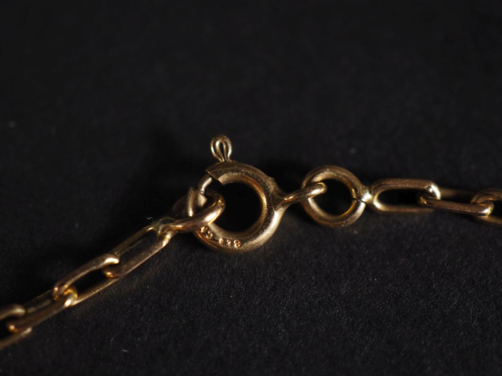 Parure en or 750 comprenant : collier et bracelet, maillons ovales ajo