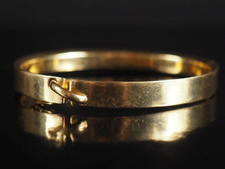 Vente aux enchères CHAUMET.  Bracelet jonc en or 750, modèle "lien" Signé et numéroté Poi