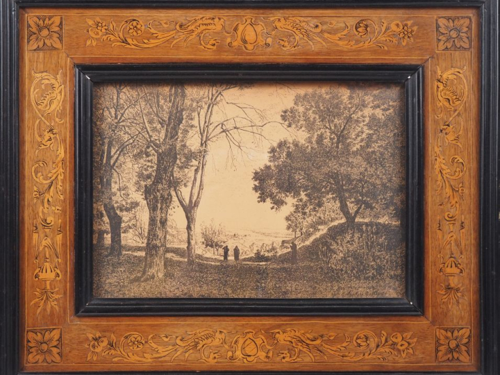 Paire d'encadrements en marqueterie italienne et bois noirci contenant