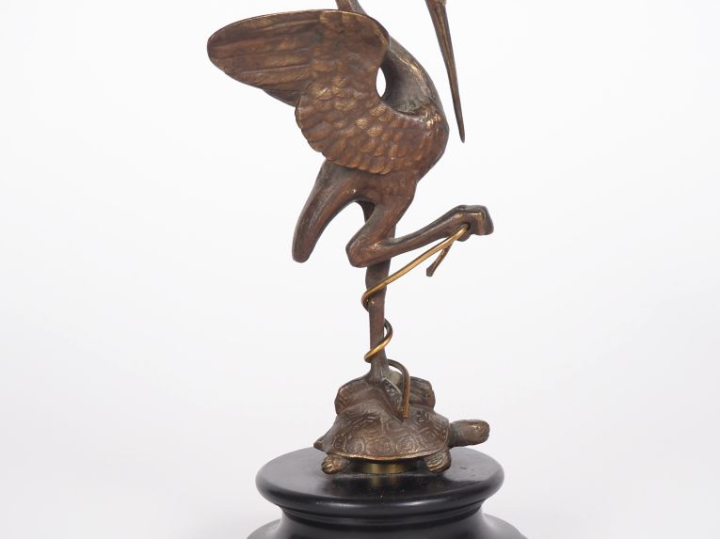 Sujet en bronze 1900 sur un socle en marbre noir, "échassier monté sur