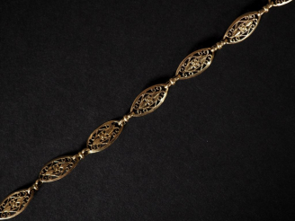 Vente aux enchères Bracelet en or jaune 750 composé de maillons ovales ajourés Long. 19,5
