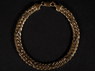 Vente aux enchères Bracelet en or jaune 750, maille plate fantaisie.  Long. 19,3 cm Poids