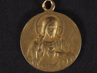 Vente aux enchères Médaille religieuse double faces en or jaune 750, figurant le Christ a