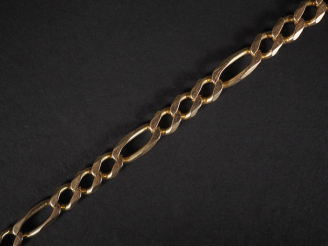 Vente aux enchères Bracelet gourmette d'homme en or jaune, 14 cts  Poids : 21 g   
