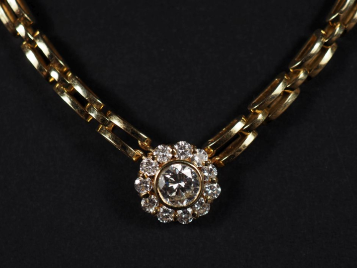 Collier en or 750, malle tank agrémenté d'un pendentif marguerite diam
