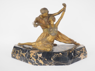 Vente aux enchères Claire COLINET.  "la danse"  Groupe en bronze patiné et doré sur un so