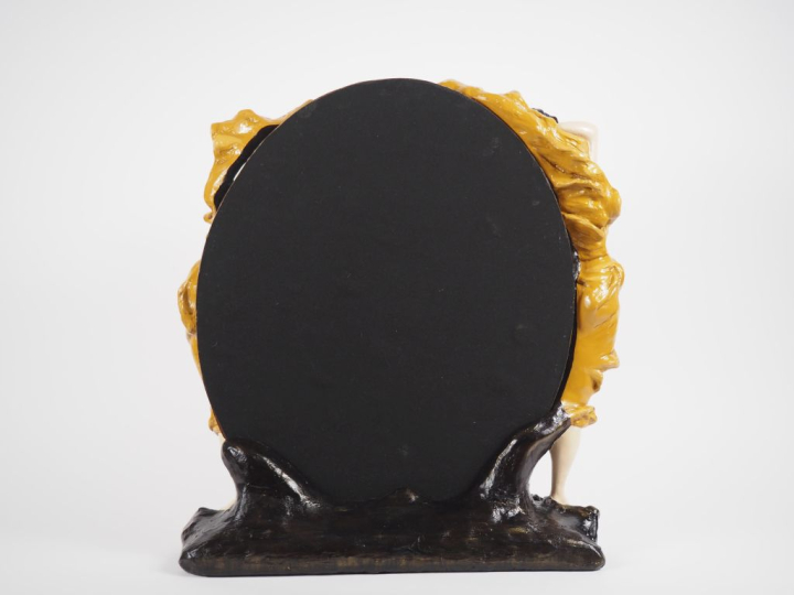 Miroir de toilette baroque en composition polychrome à décor de deux f