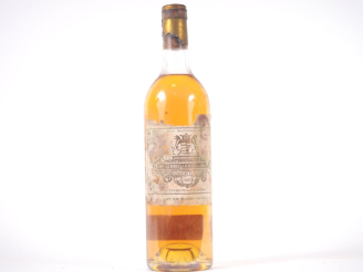 Vente aux enchères 1 BOUTEILLE CHÂTEAU FILHOT 1er CC SAUTERNES - 1985 - BG/ETA/CAPS ABIMÉ