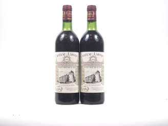 Vente aux enchères 2 BOUTEILLES CHÂTEAU LAROQUE GC ST ÉMILION - 1982 - 1 BG/1 LB 