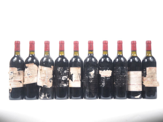 Vente aux enchères 10 BOUTEILLES DOMAINE CHEVALIER GCC GRAVES - 1985 - 6 PRÉSUMÉES/3 BONS