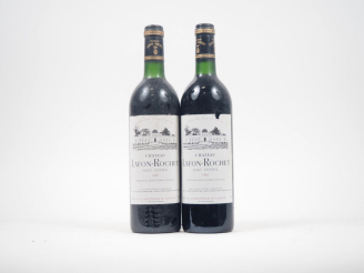 Vente aux enchères 2 BOUTEILLES CHÂTEAU LAFON ROCHET GCC ST ESTÈPHE - 1986 - 1 BON NIVEAU