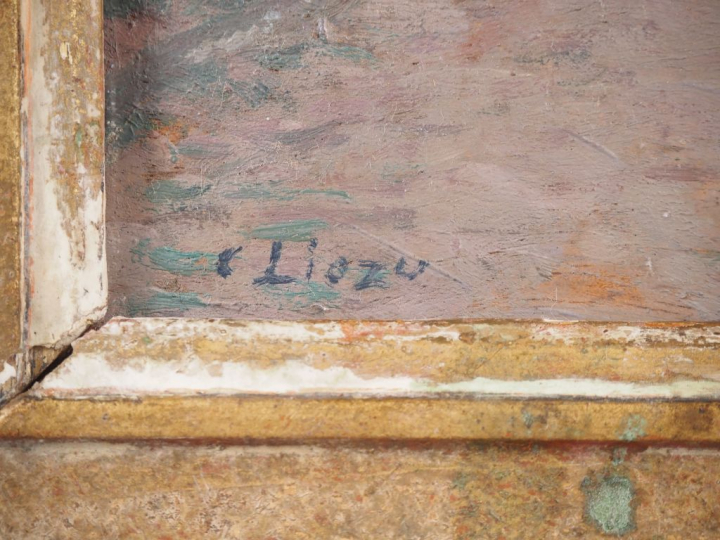 LIOZU.  "Village du midi animé" Huile sur panneau, signée en bas à gau