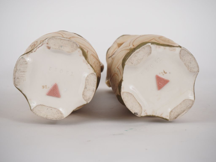 ROYAL DUX. Paire de vases en biscuit à décor polychrome et doré de fle