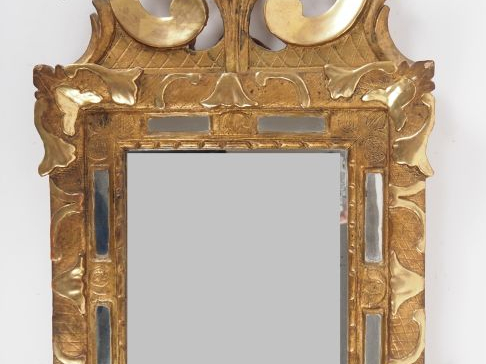 Miroir à parecloses fin XIXème - début XXème en bois et stuc doré à dé