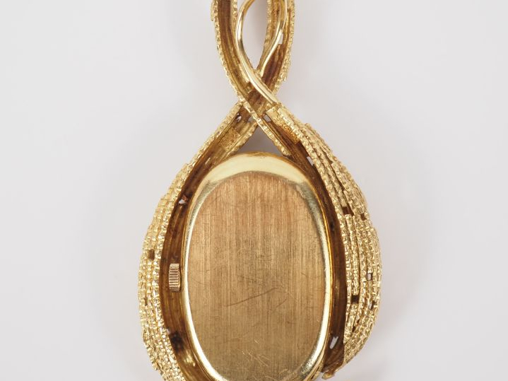 OMEGA / Andrew GRIMA Pendentif mouvementé en or jaune 750 en forme de 