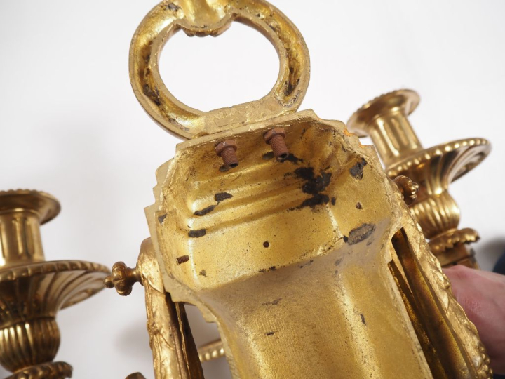 Importante paire d'appliques Napoléon III de style Louis XVI à décor d