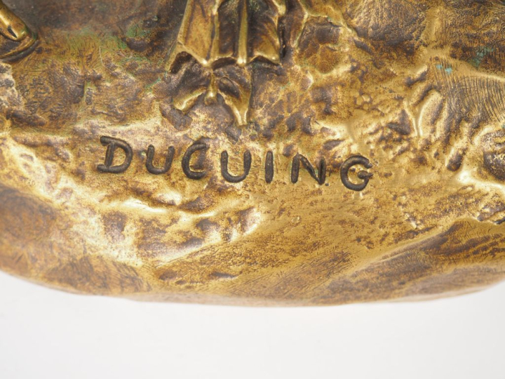 DUCUING. "Diane chasseresse" Groupe en bronze à patine dorée Signé H. 