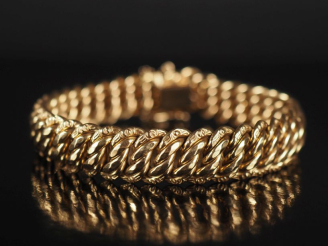 Vente aux enchères Bracelet souple en or jaune 750, maille américaine.  Chainette de sécu