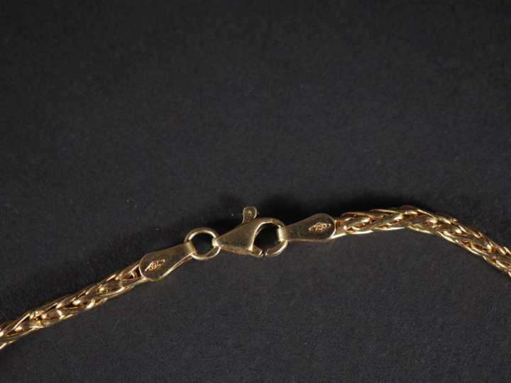 Collier souple en or jaune 750, maille palmier en chute.  Long. 40,5 c