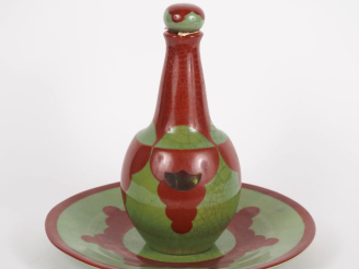 Vente aux enchères Flacon à liqueur et son présentoir de style Art Déco à décor de motifs