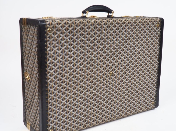 GOYARD, Paris Valise vintage en tissu gainé de cuir noir. Garniture en
