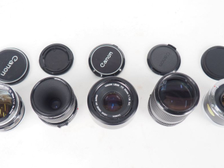 Vente aux enchères CANON. Lot de quatre objectifs : - FD 1:3.5/50 n°152459 - FD 1:1.8/50 