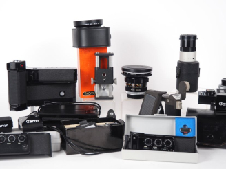 Vente aux enchères CANON. Lot d'accessoires pour appareils photographiques :  - MOTOR DRI