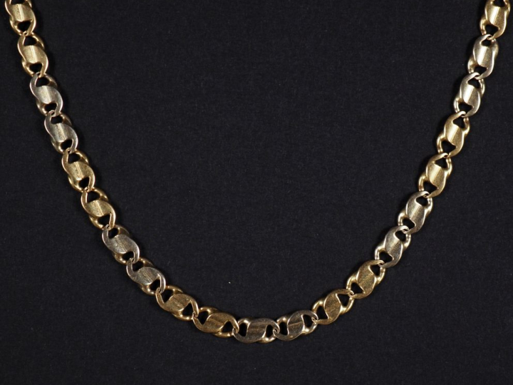 Collier souple deux tons d'or 750, composé de maillons plats ajourés e