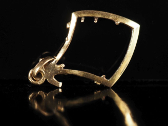 Vente aux enchères Monture de pendentif en or jaune 750. Poids. 1,07 g  (manques)