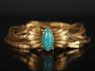 Vente aux enchères Ravissant bracelet en or jaune 750, composé de neuf brins souple à mai