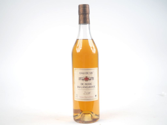 Vente aux enchères 1 BOUTEILLE EAU DE VIE DE MARC DU LANGUEDOC 42.5 % - 2005